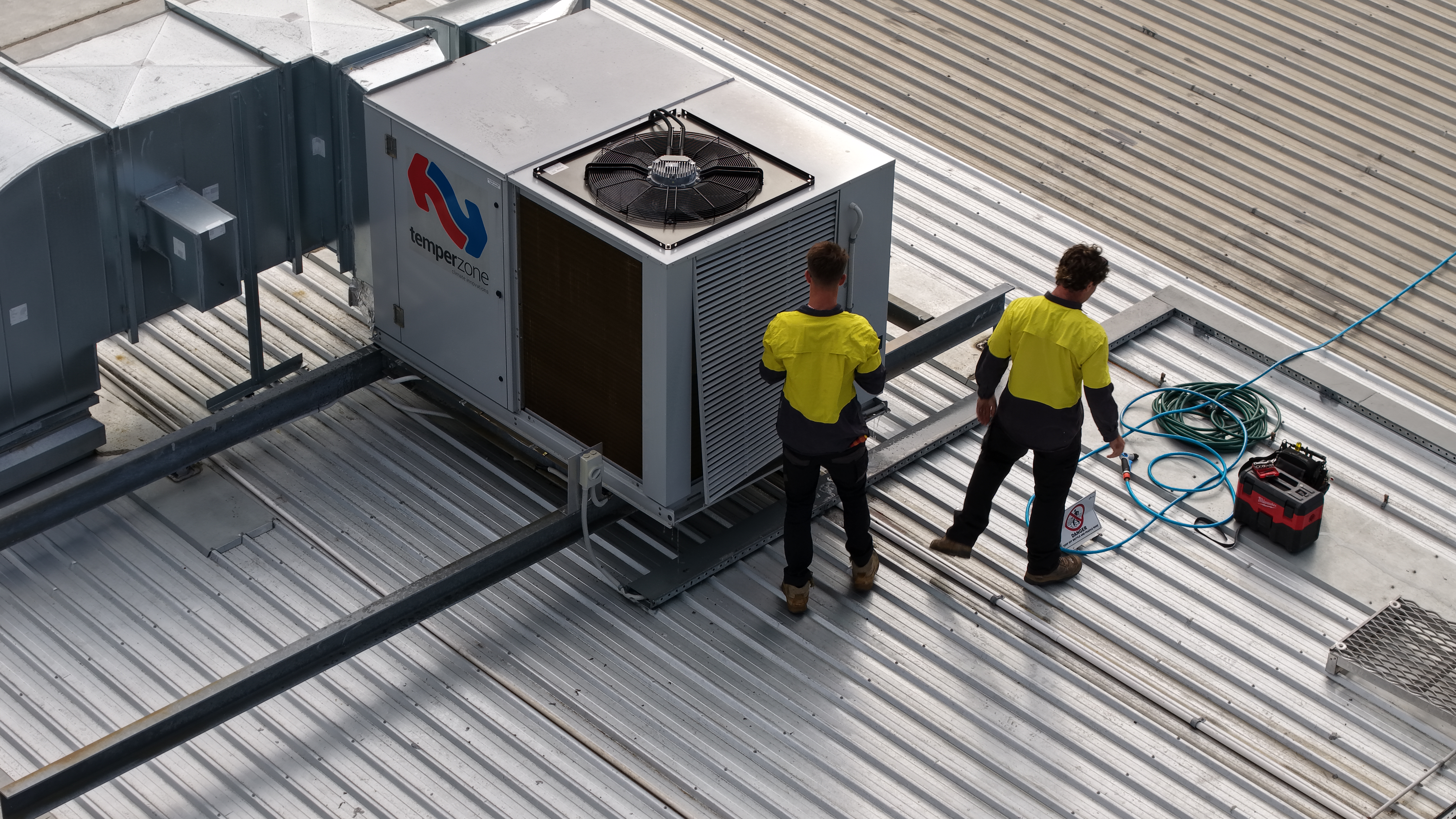 COLDCOAST servicing rooftop plant on a commercial building
